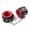 JOYGASMS Black Leather Lockable Handcuffs lined with Red Faux Fur