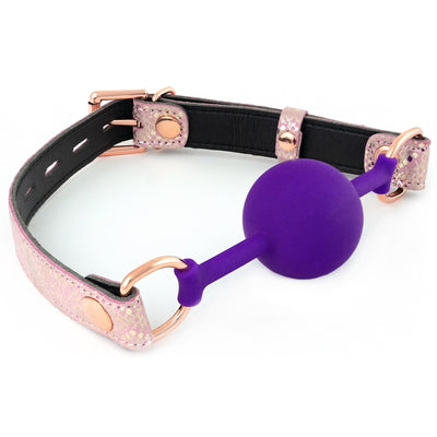 Spartacus Galaxy Purple Silicone Ball Gag with Pink Snake Print Strap and Lockable Rose Gold Buckle