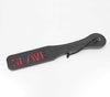 Black faux leather slapper paddle with ‘Slave’