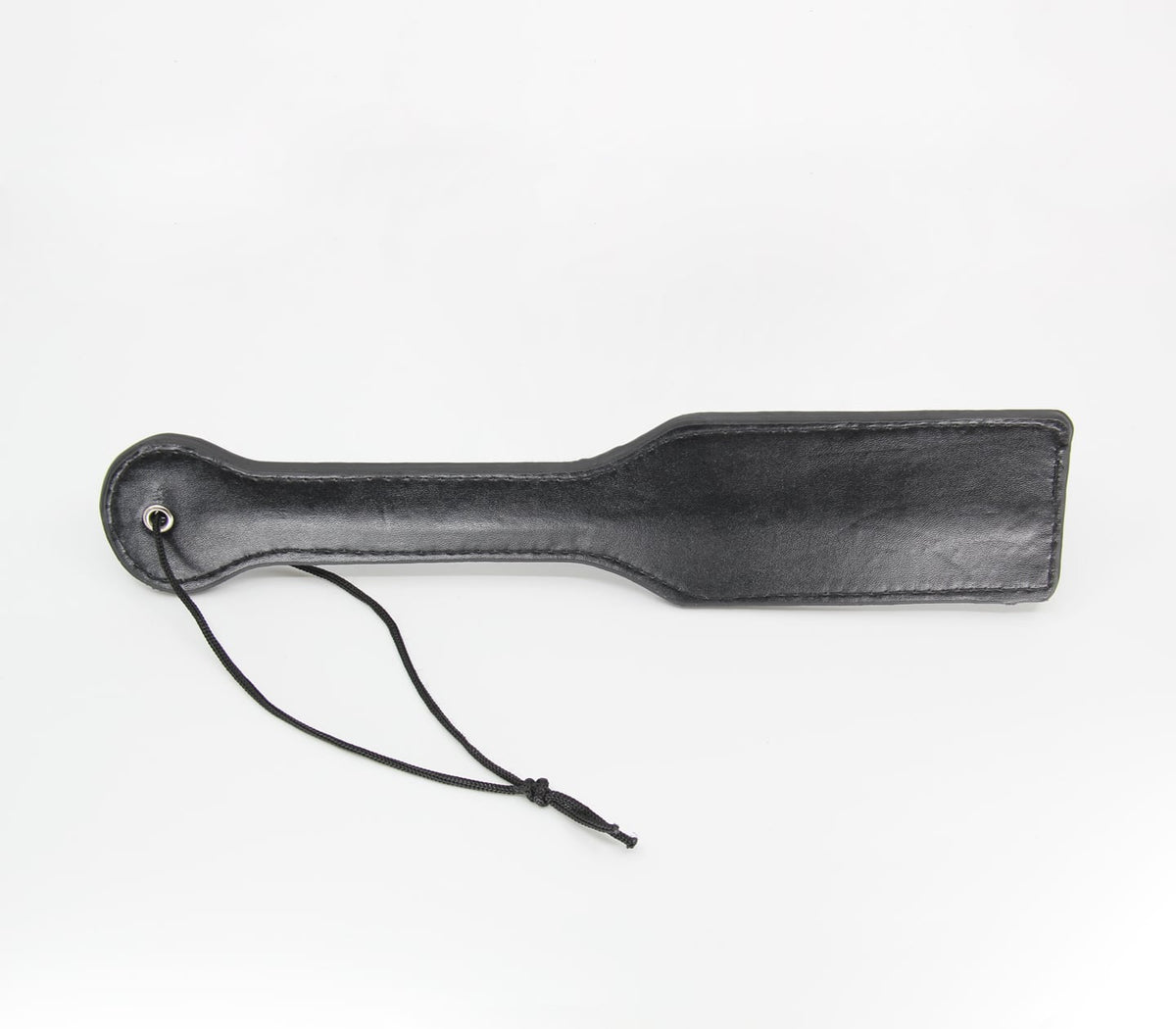 Our basic plain black  faux leather paddle with nylon wrist strap.