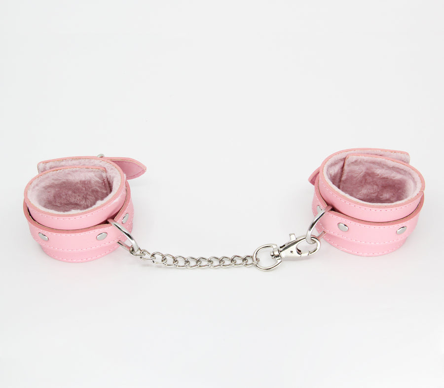 Berlin Baby Faux fur lined vegan leatherette adjustable wrist restraints with detachable chain join Pink and Silver Handcuffs