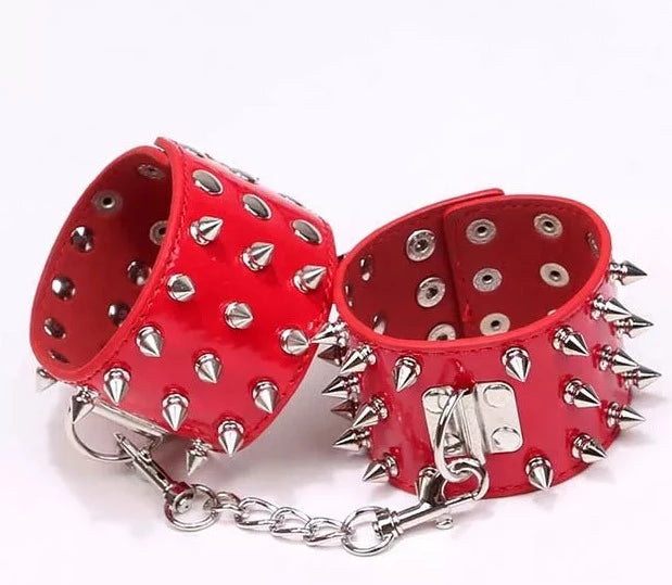 JOYGASMS Patent PU Leather Wrist Restraints with Three Row Metal Cone Spikes Red Shiny Handcuffs